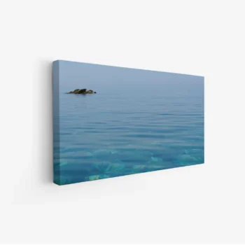 لوحات مناظر طبيعية تعكس صفاء البحر وألوانه الزرقاء الهادئة مع صخور صغيرة، لوحات جدارية أنيقة، لوحات فخمة.