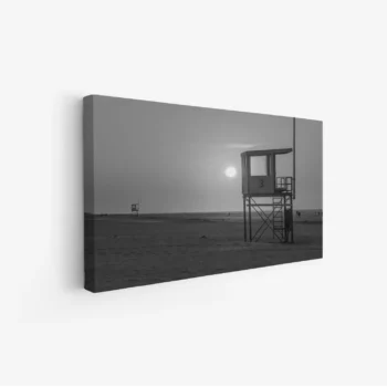 لوحات مناظر طبيعية بألوان رمادية، تظهر شاطئًا مع برج إنقاذ وغروب الشمس، جو هادئ ومريح. لوحات فنية عصرية، لوحات جدارية للمنزل، لوحات أنيقة.