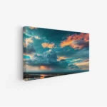 لوحة منظر ليلي تتألق فيها السحب بألوان زاهية من الأزرق والبرتقالي، تعكس أجواء هادئة ومريحة، لوحات طبيعة، لوحات كانفاس.