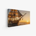 لوحة بحرية لسفينة شراعية تبحر تحت شمس غاربة، بألوان دافئة وجو هادئ، لوحات طبيعة، لوحات كانفاس.
