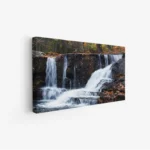 لوحات مناظر طبيعية تتضمن شلالات مياه تتدفق بين الصخور، بألوان زرقاء وخضراء هادئة، جو مريح ومنعش. لوحات فنية عصرية، لوحات جدارية للمنزل، لوحات أنيقة.